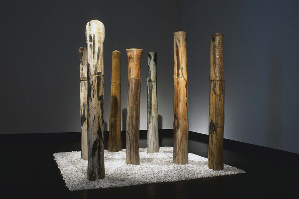 a group of wooden poles