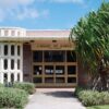 a library building with glass doors